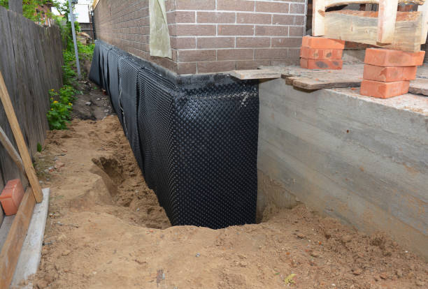 SJ Waterproofing Pros technician performing targeted Foundation Crack Repair assessment in Pleasant View, TN